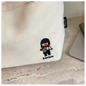 Sac cabas en toile détail esthétique minimaliste sac bandoulière quotidien robuste sac étudiant élégant
