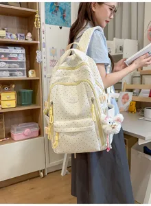 Japans stijl frisse polkadot rugzak voor dames, lichtgewicht schooltas met gele ritssluitingen.