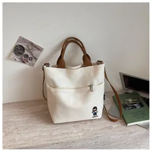 Sac cabas en toile épaisse style coréen avec poche zippée, idéal pour usage quotidien.