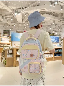 Leuke roze schoolrugzak voor meisjes met grote capaciteit en schattig sterrenpatroon.