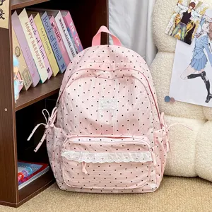 Roze stippen rugzak met schattige kantafwerking, casual schooltas voor meisjes en jonge vrouwen.