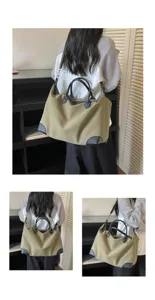 Gedetailleerde reistas grote casual tas, minimalistische oxford stof met lederen handvatten.
