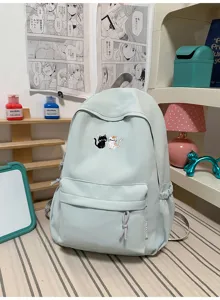 Mintgroene casual rugzak met schattig kattenborduurwerk, stijlvolle grote dagelijkse schooltas.