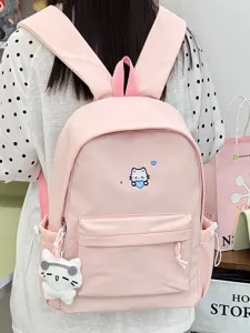 Roze canvas rugzak met schattige kattenborduursel en hanger, ideaal voor school en reizen.