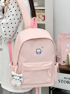 Leuke roze canvas schoolrugzak met schattige kattenborduurwerk en pluche hanger voor dagelijks.