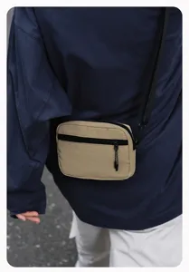Casual canvas schoudertas met voorzak met rits, ideaal voor dagelijkse reizen en buiten.