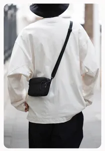 Casual zwarte crossbody tas voor dames en heren, handige lichtgewicht reistelefoontas.