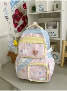 Leuke pastel schoolrugzak met grote capaciteit, transparant voorvak en mooie berenhanger.