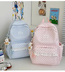 Schattige Koreaanse stippen schoolrugzak met kanten afwerking en leuke puppy hanger.