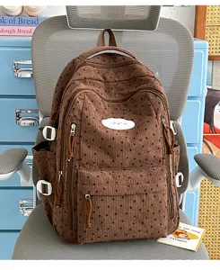 Bruine corduroy campus rugzak met sterrenprint en schattige wolk patch voor school en dagelijks.
