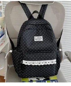 Leuke zwarte rugzak met polkadots voor meisjes met fijne kantafwerking, lichtgewicht.