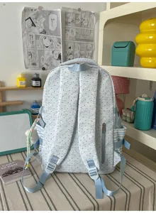 Lichtblauwe stippen konijn print schoolrugzak detail, lichtgewicht casual dagrugzak