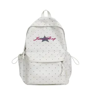 Witte rugzak met stippen voor dames, schattige ster print schooltas voor tieners en studenten.