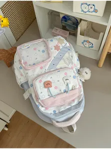 Leuke pastel schoolrugzak voor meisjes met doorzichtig voorvak en een leuk sterrenpatroon