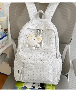 Grijze canvas rugzak met schattige konijnenprint, pluche hanger en grote capaciteit voor school.