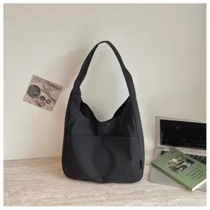 Schlichte schwarze Damen Umhängetasche aus Segeltuch, lässige Pendler Shopper Tasche.