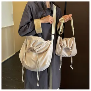 Sac bandoulière minimaliste à cordon, sac slouchy décontracté de grande capacité.