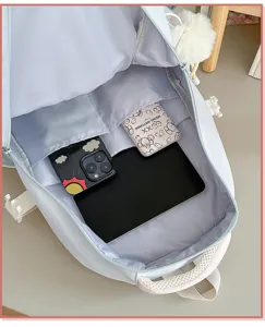 Gedetailleerd overzicht van grote schoolrugzak voor meisjes, schattige blauwe schooltas.