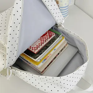 Schattige Koreaanse stijl polkadot schoolrugzak met grote capaciteit voor boeken.