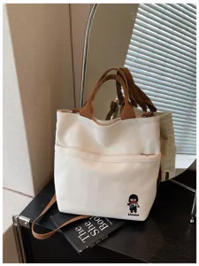 Sac cabas en toile avec anses marron et poche avant, sac d'épaule décontracté pour étudiants.