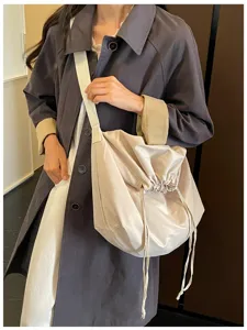 Sac à bandoulière minimaliste beige avec cordon, grand sac cabas décontracté.