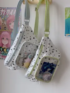 Sac ita transparent avec motif etoiles et fenetre pour badges. Modele bandouliere decontracte.