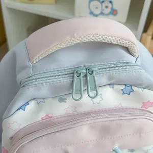 Leuke pastel schoolrugzak voor meisjes, grote capaciteit met mooi sterrenprint ontwerp.
