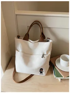 Sac cabas en toile décontracté avec anses marron, élégant sac à main pour étudiants et travail.