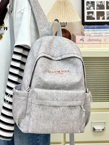 Grauer Canvas Freizeitrucksack für Studenten und Alltag, leicht und stilvoll im Design.