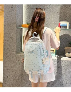 Sac à dos d'école décontracté léger de grande capacité avec motif d'étoiles pour voyages.