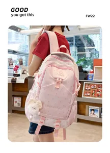 Sac à dos rose avec motif d'étoiles, léger et décontracté, cartable élégant pour étudiants.