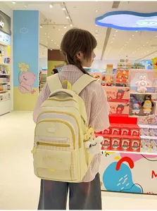 Koreaanse schoolrugzak voor studenten met leuk ruitjesdesign en vele handige vakken.