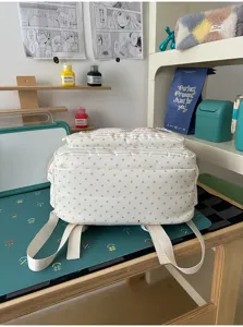 Witte canvas schoolrugzak met grijs sterrenpatroon, lichte casual dagrugzak voor studenten.