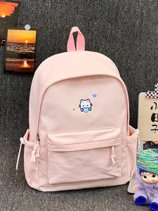 Gedetailleerd overzicht van de roze rugzak met schattig kattenborduurwerk en voorvak.