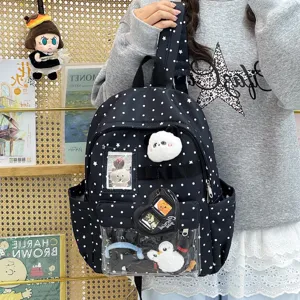 Zaino ita a pois neri con finestra trasparente e simpatici ciondoli di peluche.