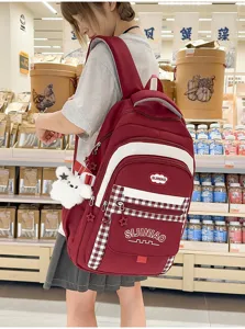 Koreaanse stijl geruite schoolrugzak voor meisjes, grote capaciteit met schattige hanger.