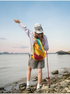 Colorful folding outdoor backpack for hiking and travel, lightweight, durable, and stylish design.