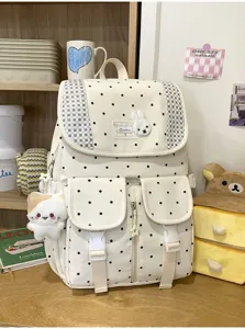 Koreaanse stijl polkadot retro rugzak met schattige konijnenpatch en casual schooltas detail.
