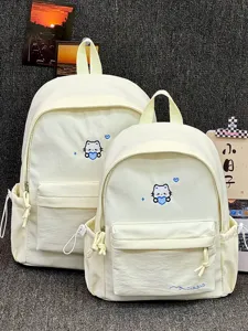 Gedetailleerd overzicht van de canvas schoolrugzak met schattig geborduurd kattenmotief en ruim voorvak.