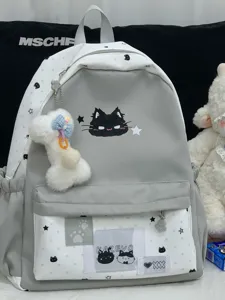 Grijze rugzak met schattig katten en sterren design detailweergave voor studenten en dames.