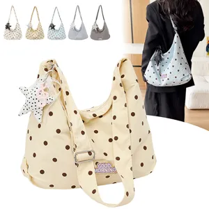 Casual stippen schoudertas voor dames, stijlvolle canvas hobo crossbodytas met sterhanger.