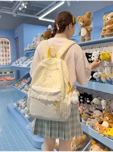 Schattige gele ruitjes rugzak met schattig puppy borduurwerk en fijne kanten afwerking voor dagelijks.