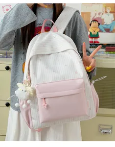 Roze en witte gestreepte esthetische rugzak voor school en dagelijks gebruik, grote capaciteit.