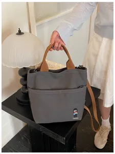 Sac cabas en toile épaisse style coréen avec bandoulière, sac de transport gris foncé.