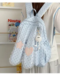 Sweet blue polka dot backpack with bunny ears lace trim star heart patches and cute plush pendant.