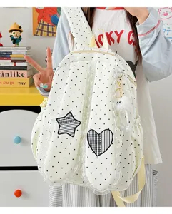 Sweet polka dot backpack with lace trim, bunny ears design, and plaid star heart patches.