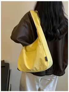 Gelbe Canvas Umhängetasche für die Arbeit, lässige Tote Bag mit praktischen Aussentaschen.