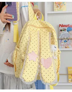 Sweet lace polka dot bunny ear backpack with star heart patch for cute daily school use.