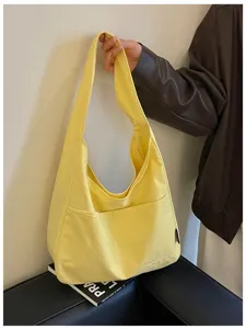 Einfache einfarbige Canvas Umhängetasche, lässige Pendler Schultertasche für Studenten in Gelb.