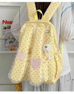 Cute polka dot bunny ear backpack detail, lace trim and sweet school bag design feature.